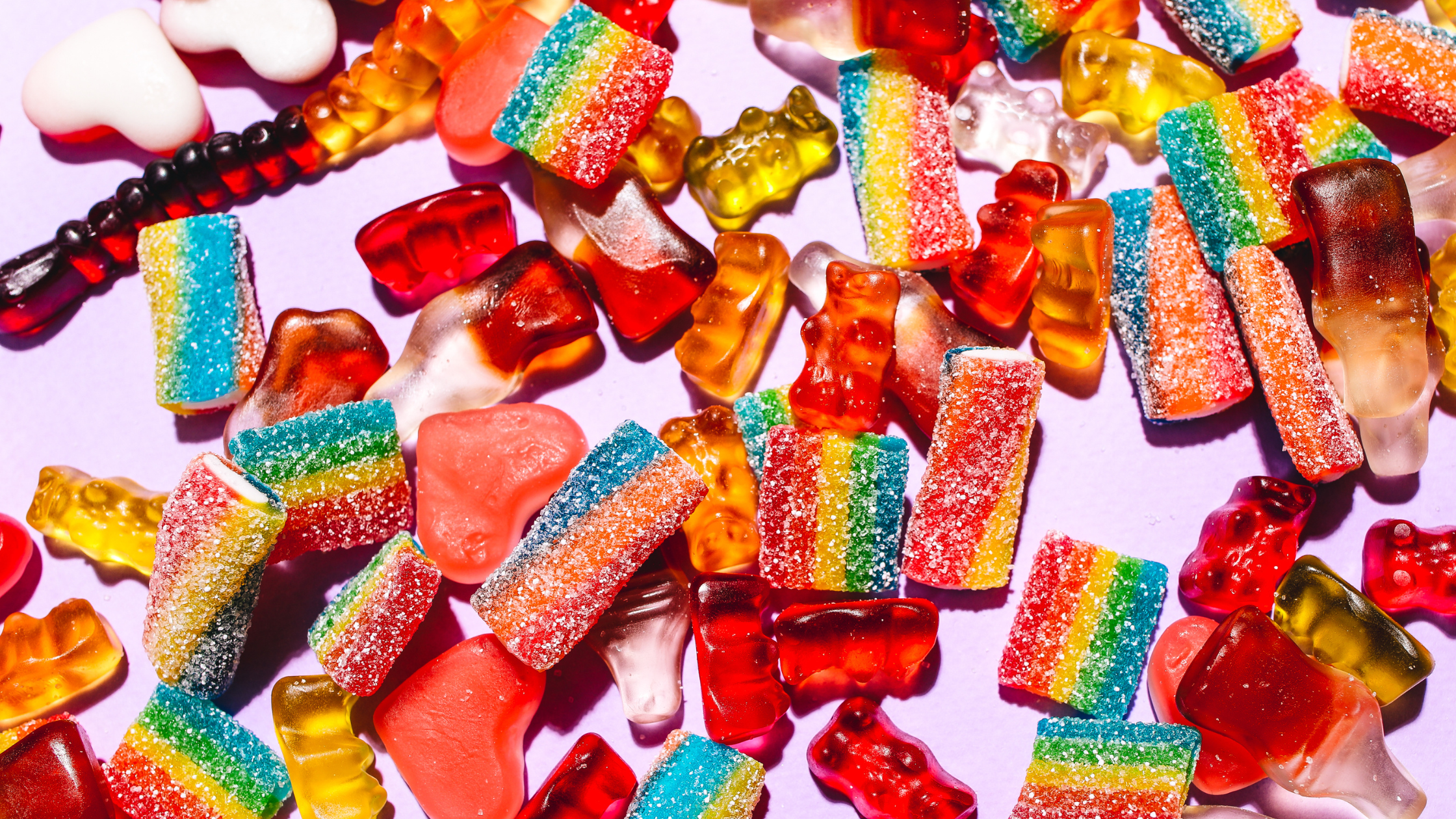 Sweets and gummies with food dyes can potentially impact a child's gut health.